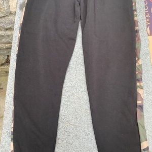 It’s black joggers with green dark blue  brown